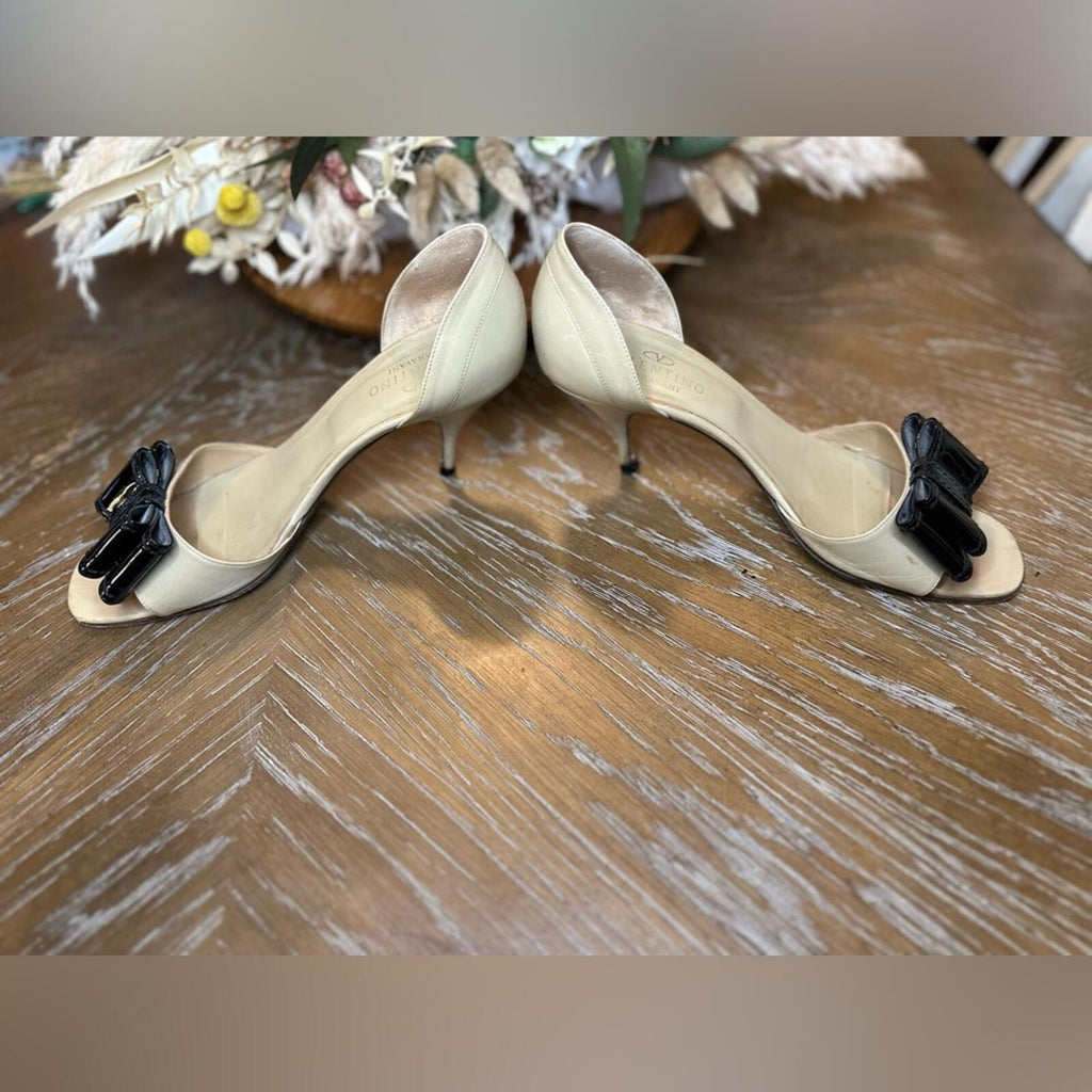 Valentino Garavani Nude Leather Open-Toe Pumps with Black Patent Bow